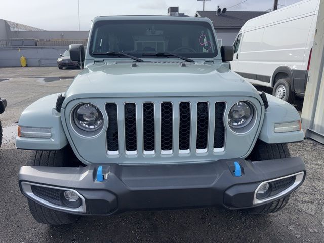 Used 2023 Jeep Wrangler 4xe Sahara 4XE with VIN 1C4JJXP65PW651345 for sale in Huntington Beach, CA