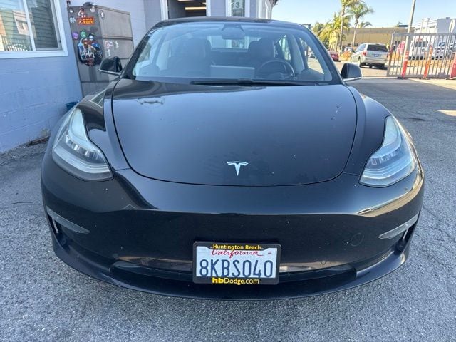 Used 2019 Tesla Model 3 Mid Range with VIN 5YJ3E1EA0KF324558 for sale in Huntington Beach, CA