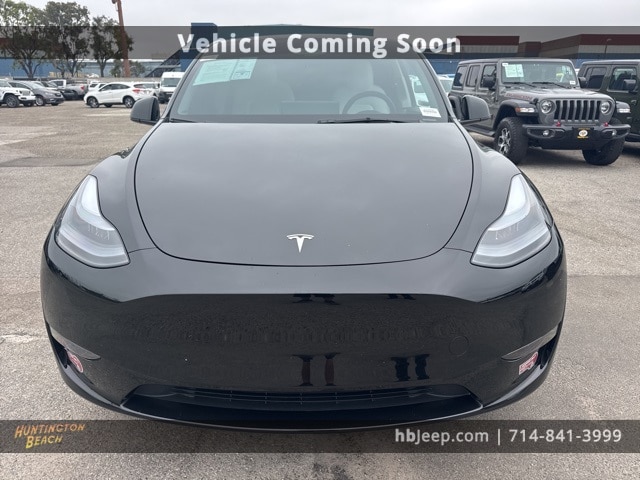 Used 2025 Tesla Model Y Long Range with VIN 7SAYGDED9SF222156 for sale in Huntington Beach, CA