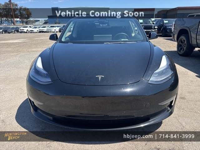 Used 2022 Tesla Model 3 Long Range with VIN 5YJ3E1EBXNF277049 for sale in Huntington Beach, CA