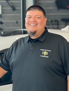 Staff member Chris Sanchez from 5f6320f214a1