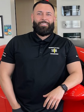 Staff member Wally Garcia from 746e3d60489e