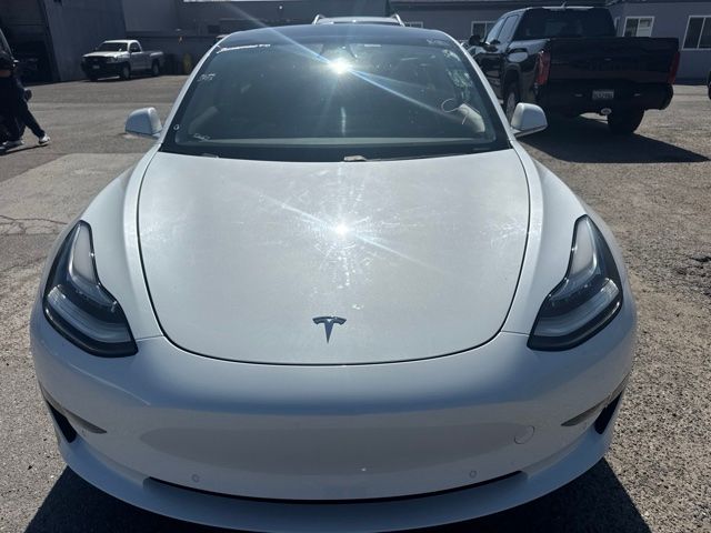 Used 2019 Tesla Model 3 Mid Range with VIN 5YJ3E1EAXKF472488 for sale in Huntington Beach, CA