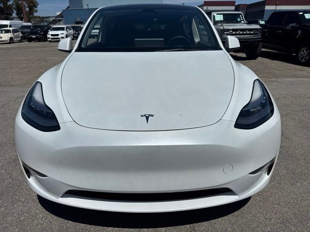 Used 2023 Tesla Model Y Long Range with VIN 7SAYGDEE1PA078034 for sale in Huntington Beach, CA