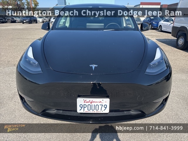 Used 2025 Tesla Model Y Long Range with VIN 7SAYGDEDXSF217127 for sale in Kansas City