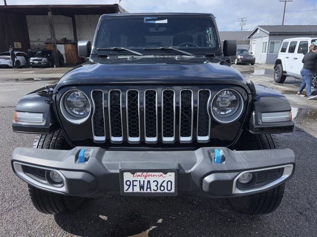 Used 2023 Jeep Wrangler 4xe Sahara 4XE with VIN 1C4JJXP64PW664720 for sale in Huntington Beach, CA