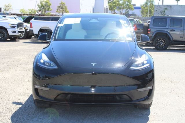 Used 2024 Tesla Model Y Long Range with VIN 7SAYGAEE1RF003354 for sale in Huntington Beach, CA
