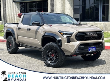 Featured pre-owned 2025 Toyota Tacoma i-FORCE MAX TRD Pro Truck Double Cab for sale near you in Huntington Beach, CA