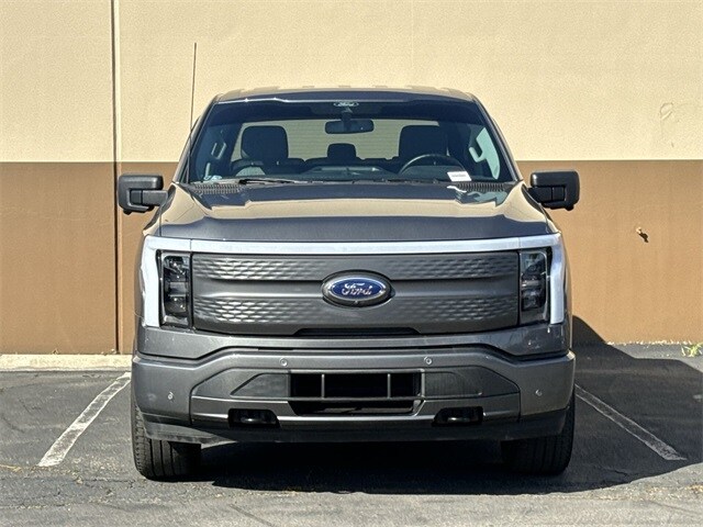 Used 2022 Ford F-150 Lightning XLT with VIN 1FTVW1EL4NWG02384 for sale in Huntington Beach, CA