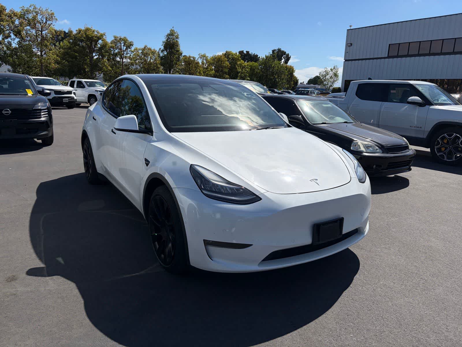 Used 2021 Tesla Model Y Long Range with VIN 5YJYGAEE5MF159631 for sale in Huntington Beach, CA