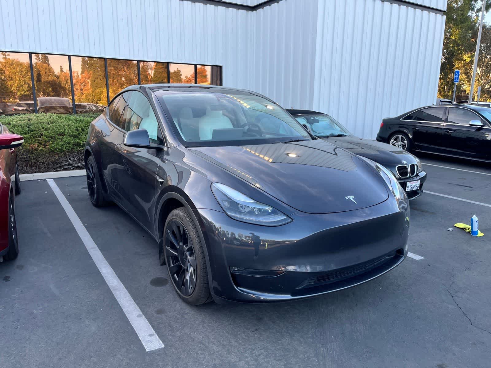 Used 2024 Tesla Model Y Long Range with VIN 7SAYGDEE1RA221101 for sale in Huntington Beach, CA