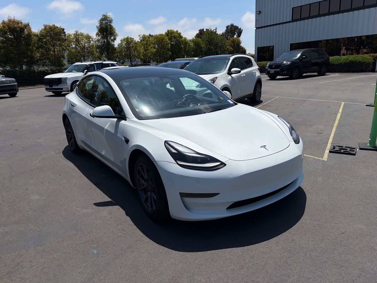 Used 2022 Tesla Model 3 Long Range with VIN 5YJ3E1EB0NF152030 for sale in Huntington Beach, CA