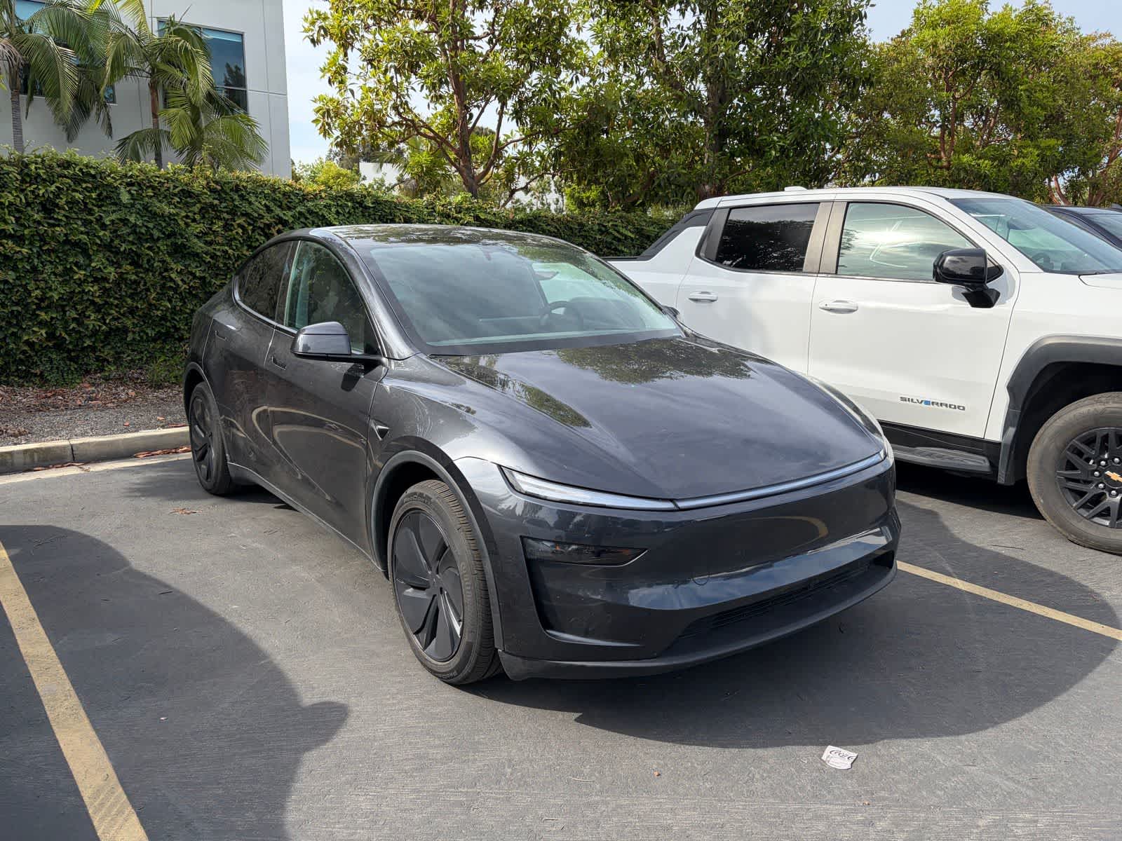 Used 2026 Tesla Model Y Long Range with VIN 7SAYGDEE2TF333030 for sale in Huntington Beach, CA