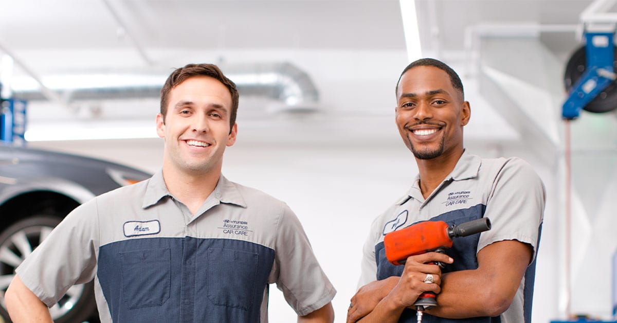 Technicians in a Hyundai dealership service center