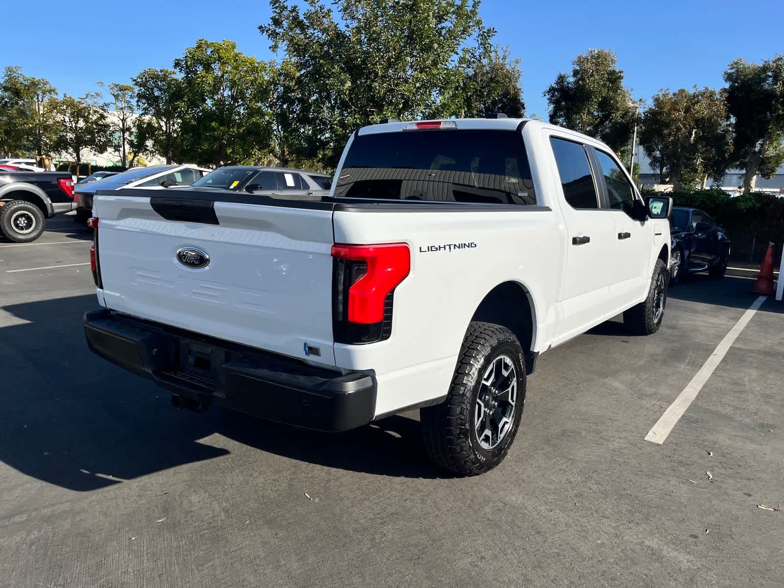Used 2022 Ford F-150 Lightning Pro with VIN 1FTVW1EL1NWG08885 for sale in Huntington Beach, CA