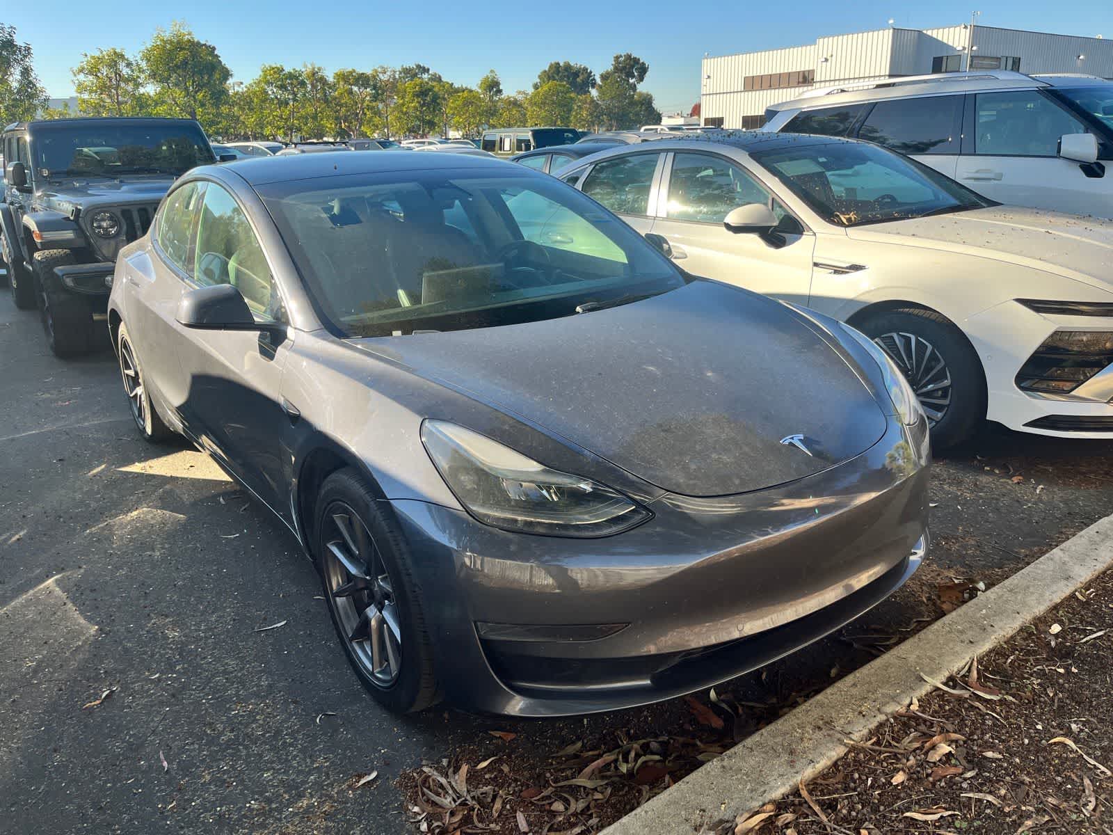 Used 2022 Tesla Model 3 Base with VIN 5YJ3E1EA7NF189986 for sale in Huntington Beach, CA