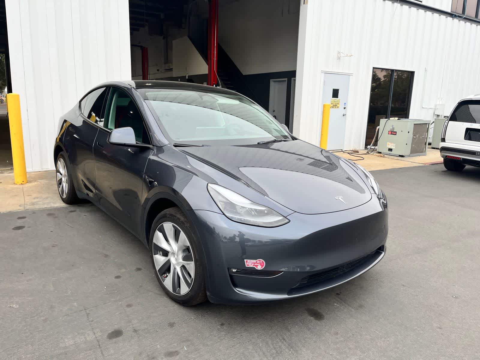 Used 2023 Tesla Model Y Long Range with VIN 7SAYGDEE8PF916207 for sale in Kansas City