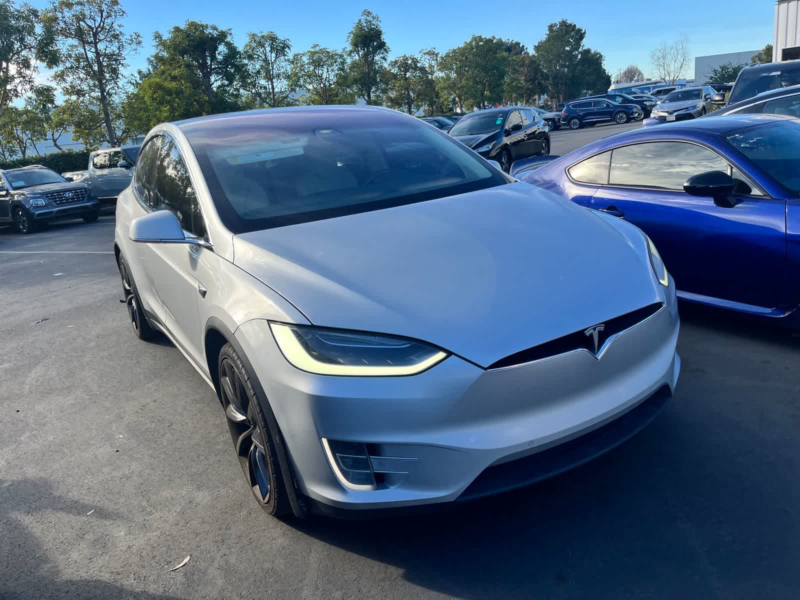 Used 2018 Tesla Model X 75D with VIN 5YJXCAE25JF104573 for sale in Huntington Beach, CA