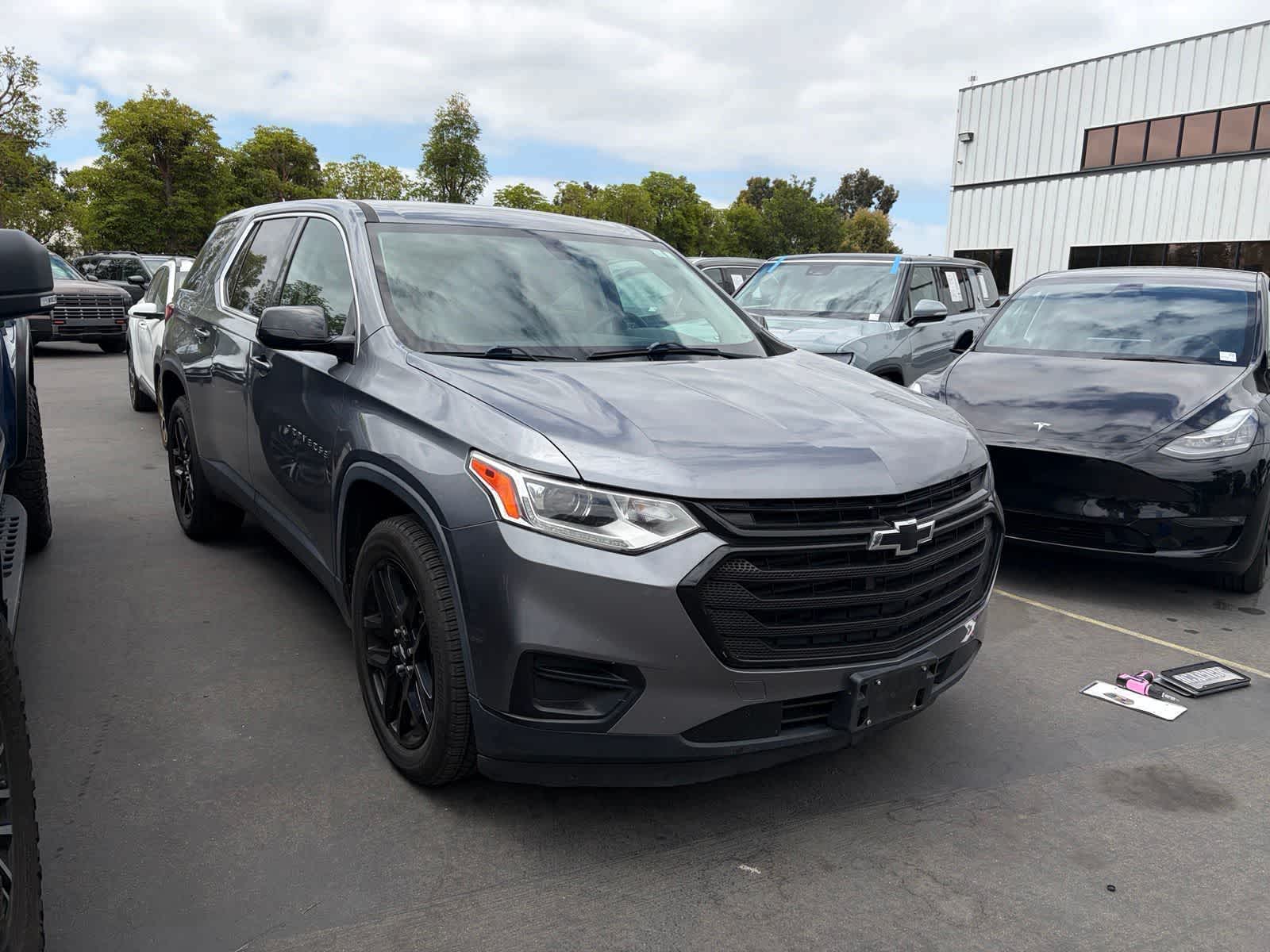 Used 2018 Chevrolet Traverse LS with VIN 1GNERFKW8JJ236527 for sale in Huntington Beach, CA