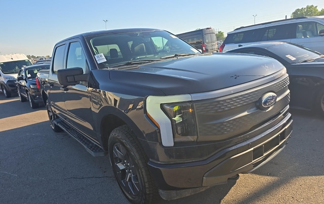 Used 2023 Ford F-150 Lightning XLT with VIN 1FTVW1EL8PWG23418 for sale in Huntley, IL