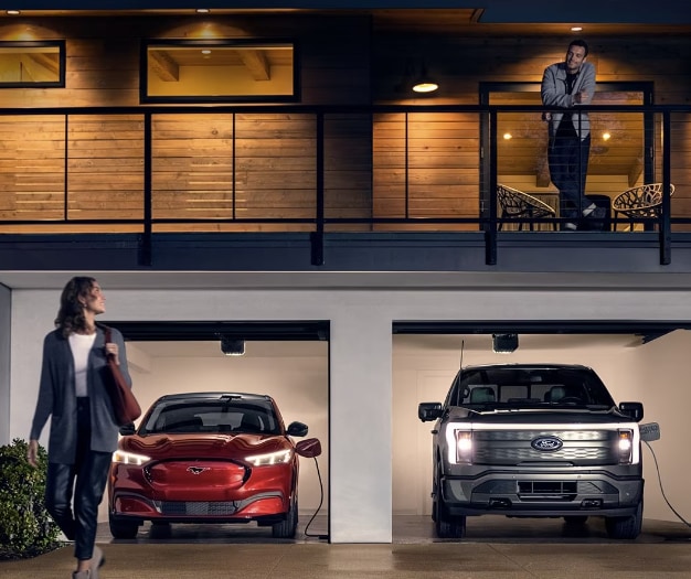 Ford Mustang man woman electric vehicle charging
