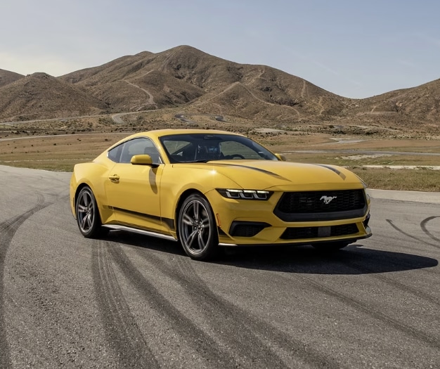 2024 Ford Mustang in yellow parking