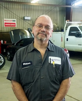 Staff member William Miller from c722c90897bc