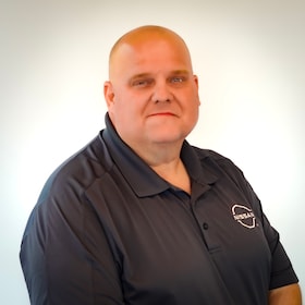 Staff member John Collings from b971d5abcdee