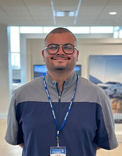 Staff member Zain Naqvi from ID_dc236093ae04