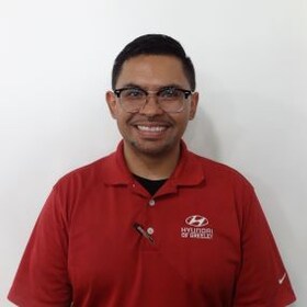 Staff member Luis Meza  from ID_897cba16c42d