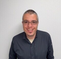 Staff member Rick Gonzales  from ID_897cba16c42d