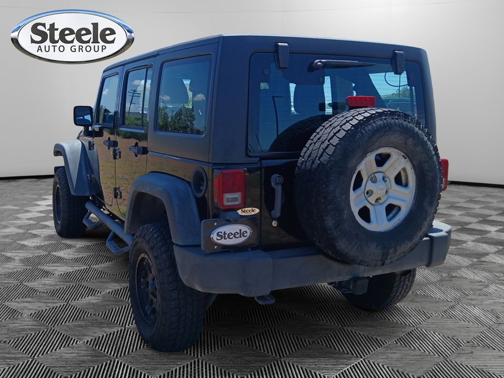 Used 2011 Jeep Wrangler Unlimited Sport with VIN 1J4BA3H17BL518025 for sale in Kyle, TX