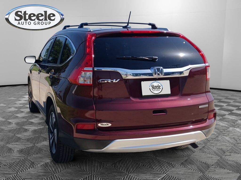 Used 2015 Honda CR-V Touring with VIN 5J6RM3H90FL026129 for sale in Kyle, TX
