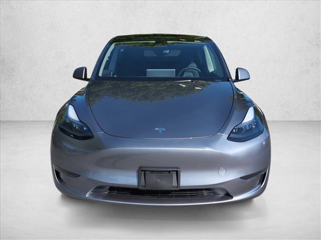 Used 2025 Tesla Model Y Long Range with VIN 7SAYGDED5SA350665 for sale in Buford, GA