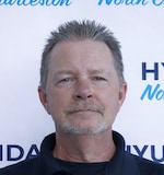 Staff member Mike Oldham from ID_785488