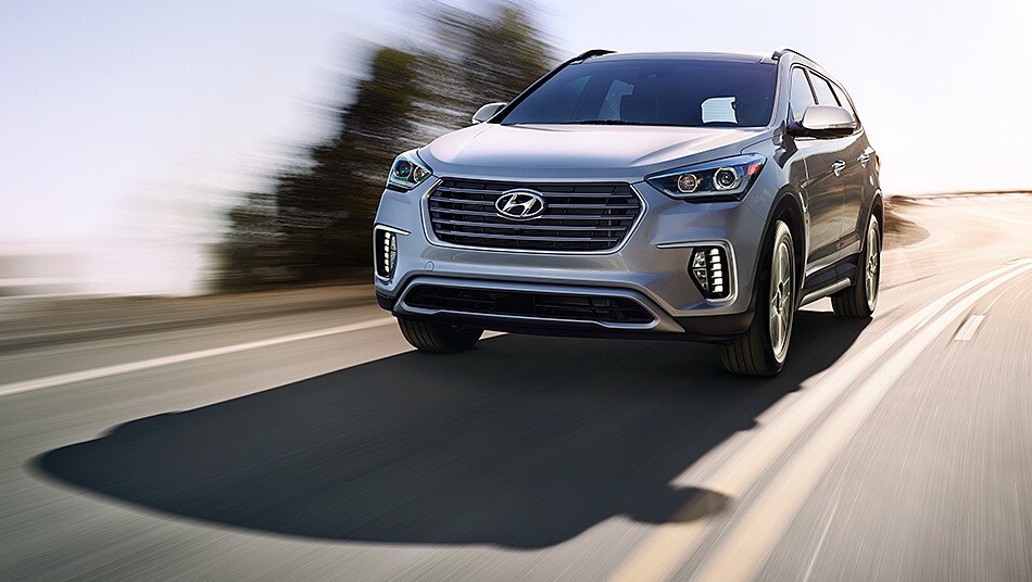 Hyundai speeding down the road