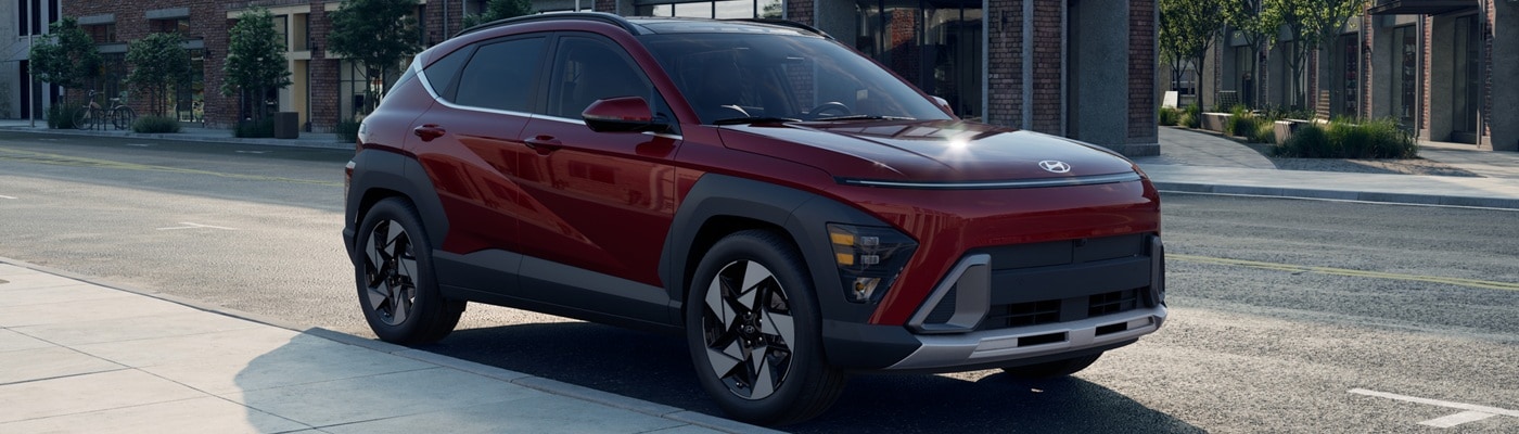 Red Hyundai Kona SUV Limited parked on a city street