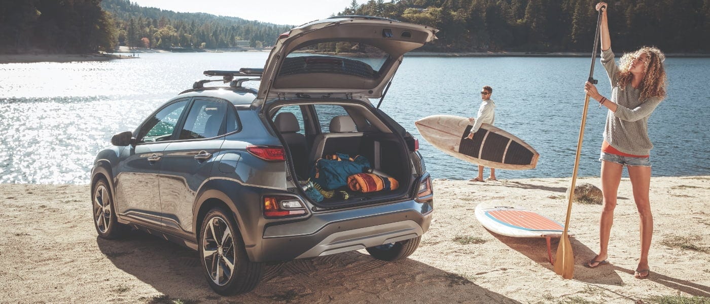 Hyundai Kona A couple near a 2020 Hyundai Kona