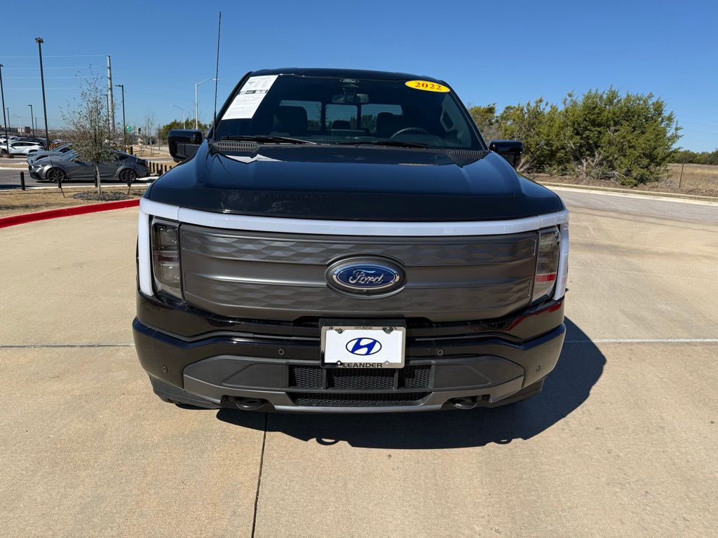 Used 2022 Ford F-150 Lightning Lariat with VIN 1FTVW1EL4NWG15166 for sale in Leander, TX