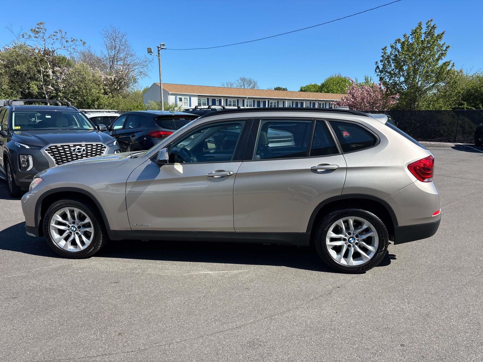 Used 2015 BMW X1 28i with VIN WBAVL1C57FVY39582 for sale in Middletown, RI