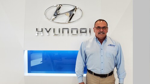 Staff member Bill Germano from ID_a9b92c279754