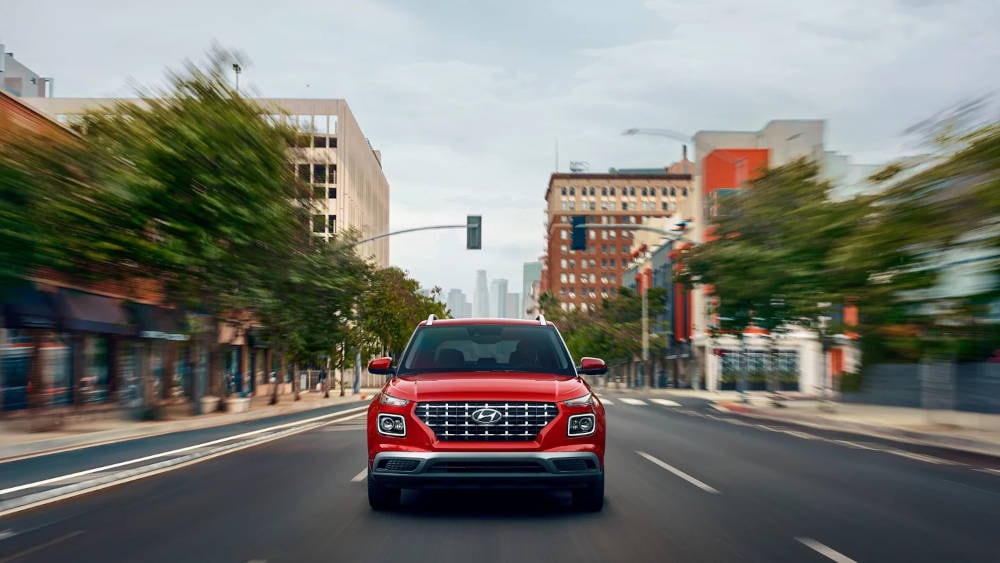 2024 Hyundai Venue driving through the city