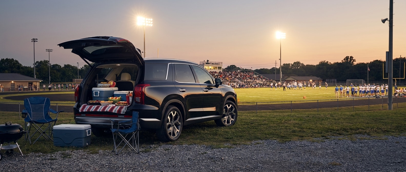 2026 Hyundai Palisade with liftgate open at a Middle Tennessee high school football stadium on a Friday night in September 2026