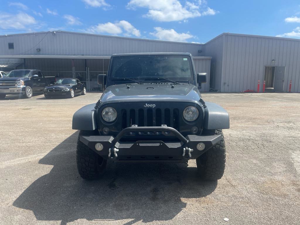 Used 2016 Jeep Wrangler Unlimited Rubicon with VIN 1C4BJWFG3GL221677 for sale in Tuscumbia, AL