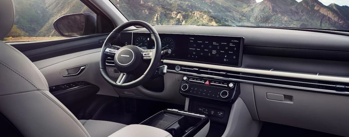 The gray interior and dash in a 2025 Hyundai Tucson for sale near Matthews.