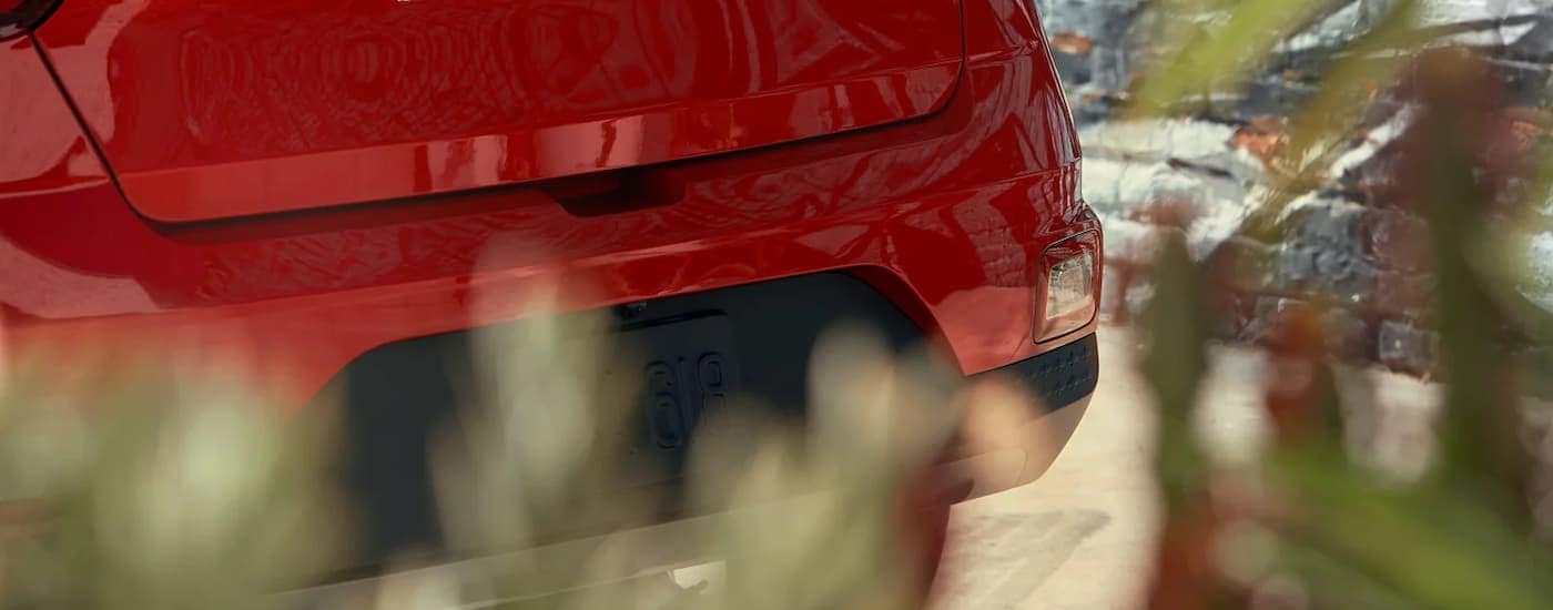 Close up of the rear bumper on a red 2025 Hyundai Venue