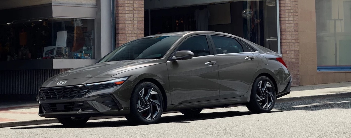 A grey 2025 Hyundai Elantra N-Line is shown from the side after leaving a Hyundai dealer.