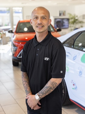 Staff member Randolph Villamil from 7618d05b8651