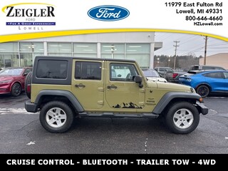Used 2013 Jeep Wrangler Unlimited Unlimited Sport SUV for sale in Grandville