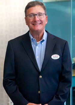 Staff member Charles Burton from ID_71e3f0294979